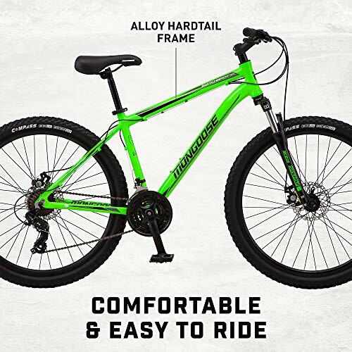 Green mountain bike with alloy hardtail frame.